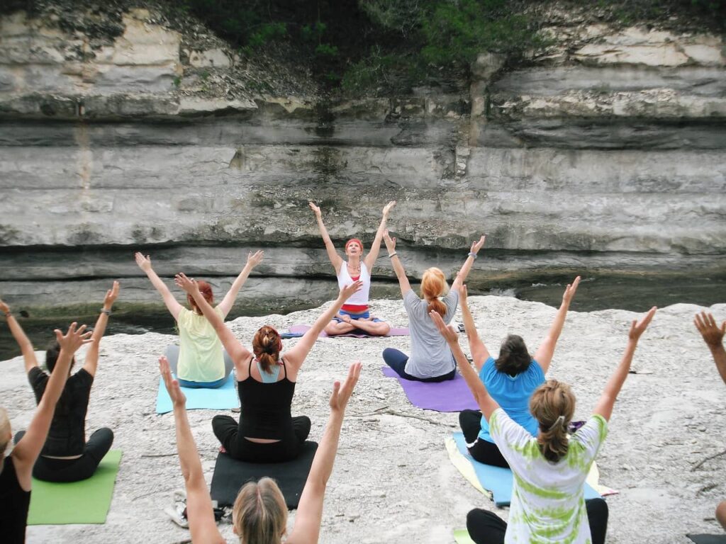 yoga instructor with class