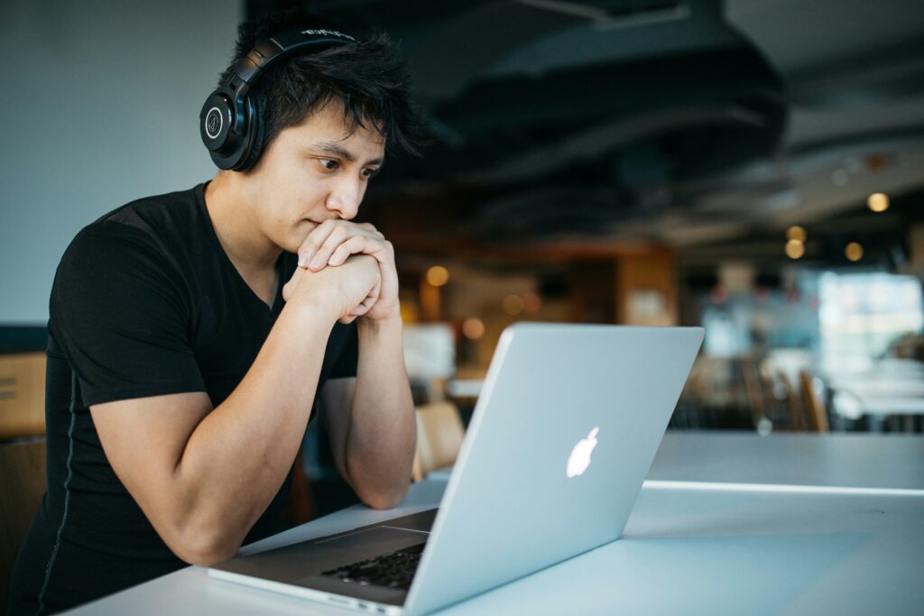 man studying on computer