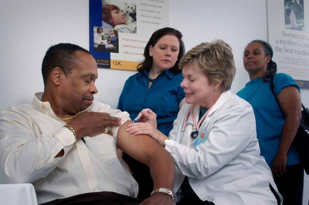 person getting vaccine