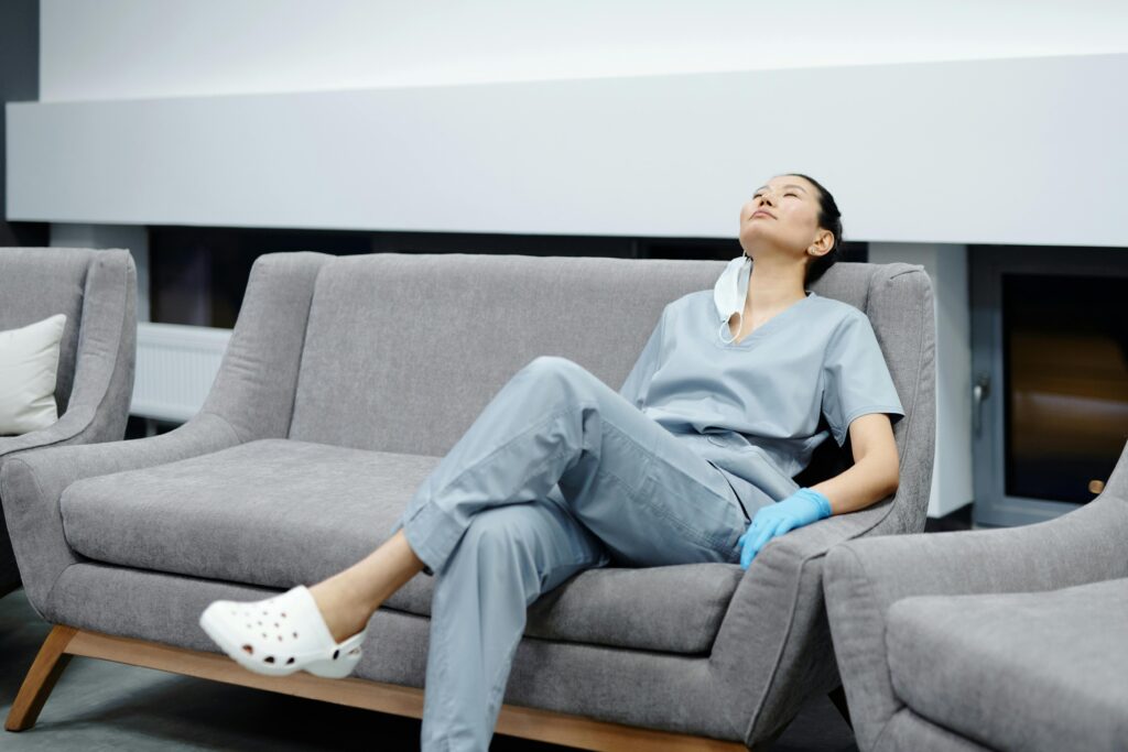 nurse resting on couch