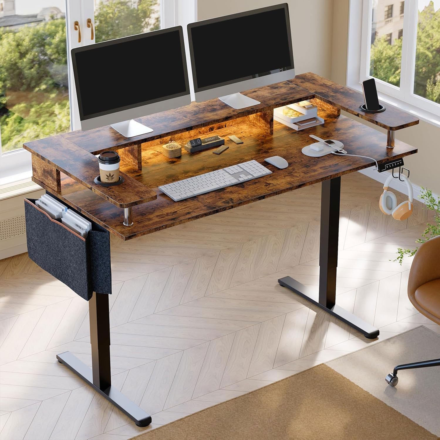 Bestier LED Electric Standing Desk Adjustable Height, 58x26 Inch Large Sit Stand Desk with Monitor Stand, Ergonomic Rising Desk for Home Office Workstation, Headphone Hook Storage Bag Brown